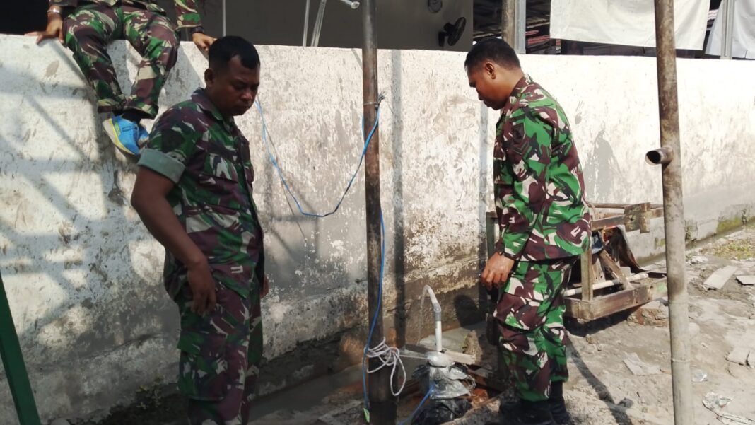 SATGAS TMMD KE-129 KODIM 0418/PALEMBANG RAMPUNGKAN TAHAP FINISHING SUMUR BOR RUMAH TAHFIZ DI TALANG JAMBI SATGAS TMMD KE-129 KODIM 0418/PALEMBANG RAMPUNGKAN TAHAP FINISHING SUMUR BOR RUMAH TAHFIZ DI TALANG JAMBI