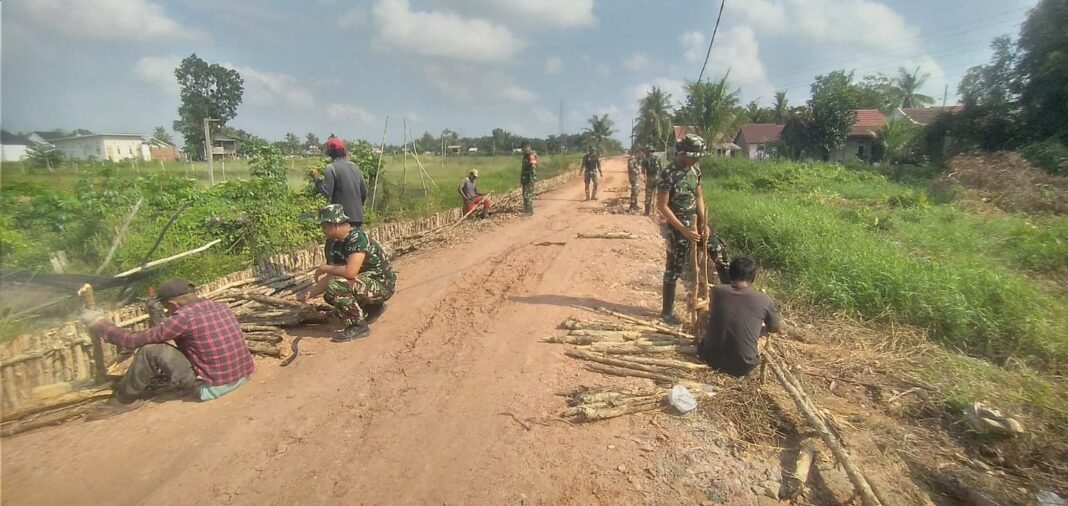 MEMASUKI HARI KE-17, SATGAS TMMD KE-129 KODIM 0418/PALEMBANG KEBUT PEMBANGUNAN JALAN 750 METER MEMASUKI HARI KE-17, SATGAS TMMD KE-129 KODIM 0418/PALEMBANG KEBUT PEMBANGUNAN JALAN 750 METER